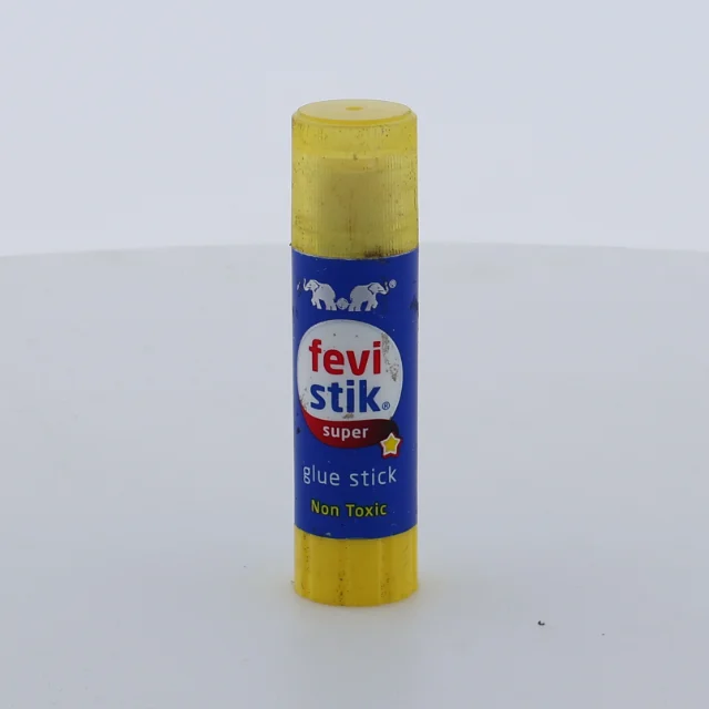 A glue stick standing upright