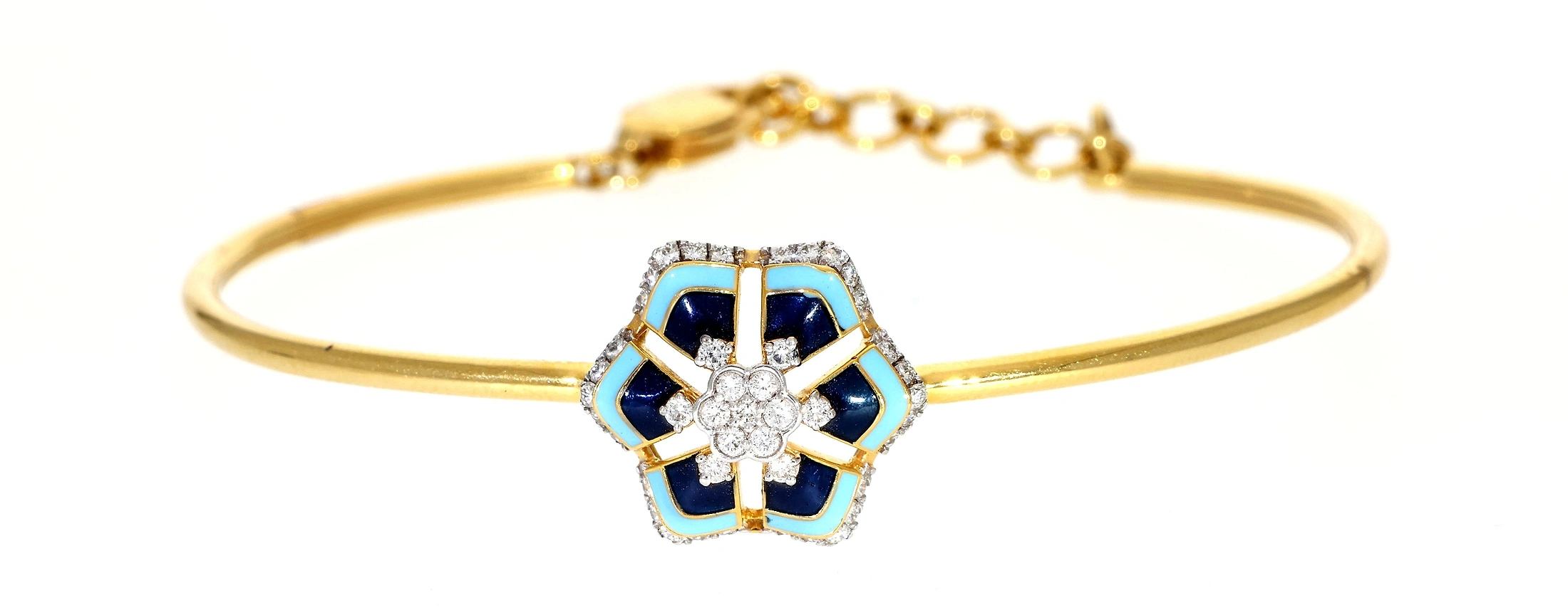 Gold bracelet with gemstone flower